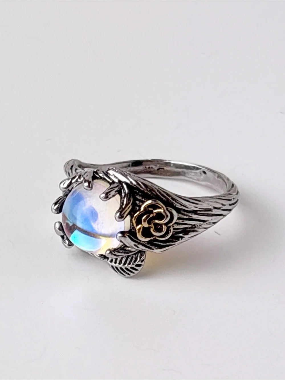 Sterling Silver Flower and Leaf Motif Moonstone Ring in Iridescent Blue